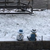 Swedish-Couple-observes-dusting-of-snow-while-boat-launch-stays-on-shore